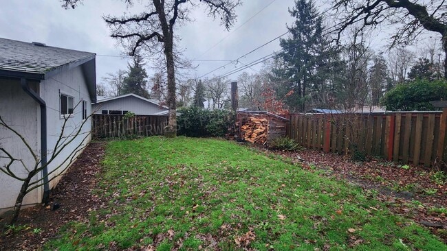 Photo - 3 bd 2ba Ranch Style Home with Fenced Yard, W/D in Unit, Fireplaces & 2 Car Garage!