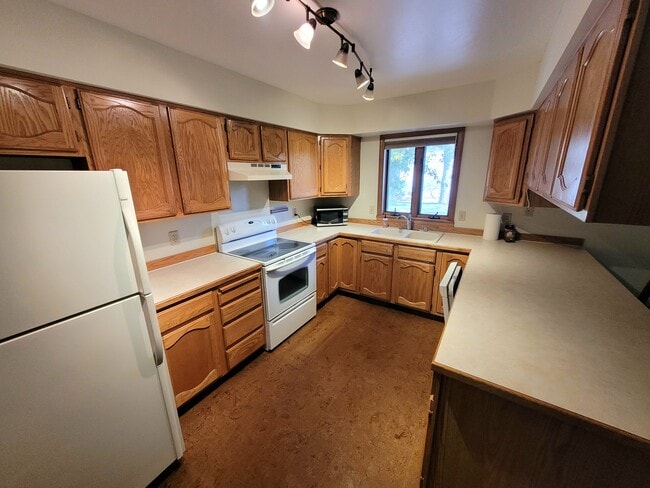 Kitchen - 1711 W Koch St Unit Cedarwinds #34