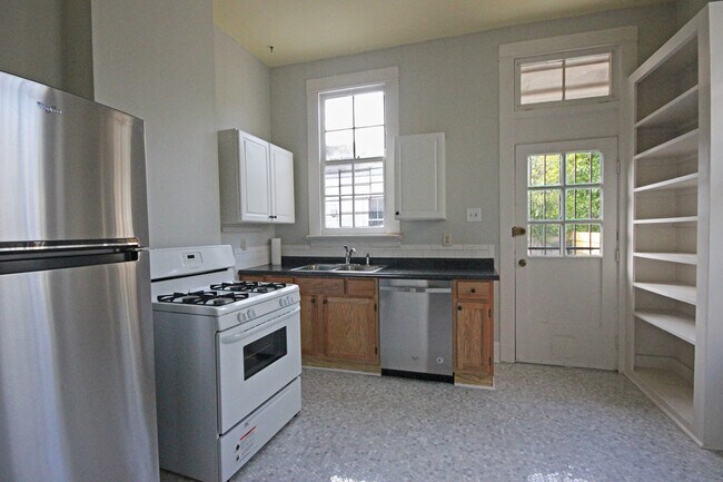 Kitchen (base cabinets now painted gray) - 8210 Plum St