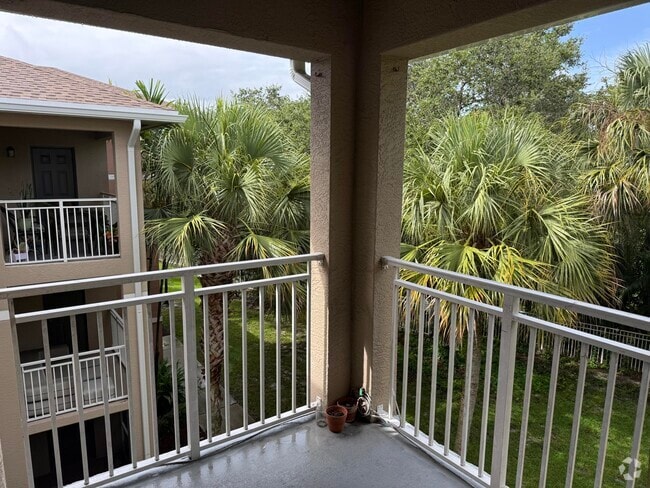 Building Photo - 6556 Emerald Dunes Dr Unit 306 Rental