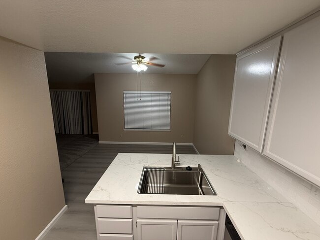 Dining area new flooring - 1102 Cedar Creek Dr