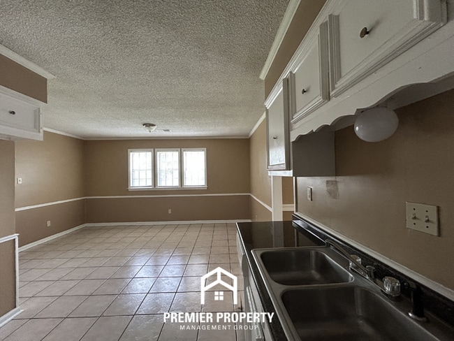 Photo - Beautiful 3BR/2BA Near Southwind | 1,681 Sq Ft, Vaulted Ceilings, Hardwood Floors & Garage