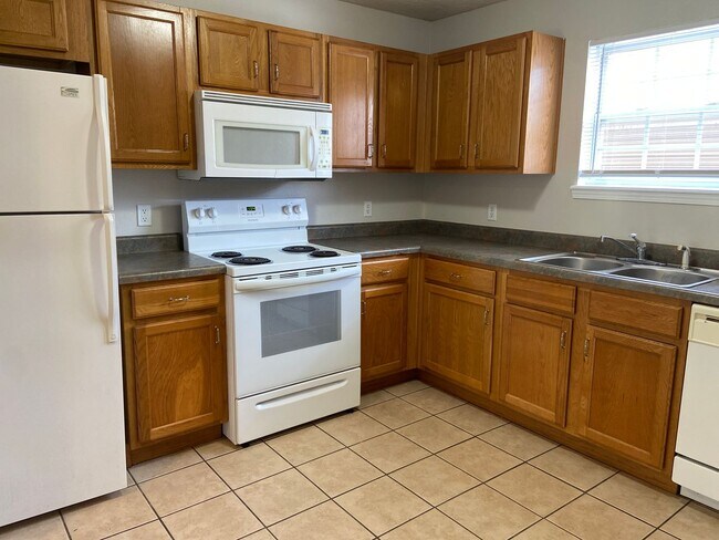 Photo - Condominium in Academy Commons Unit A