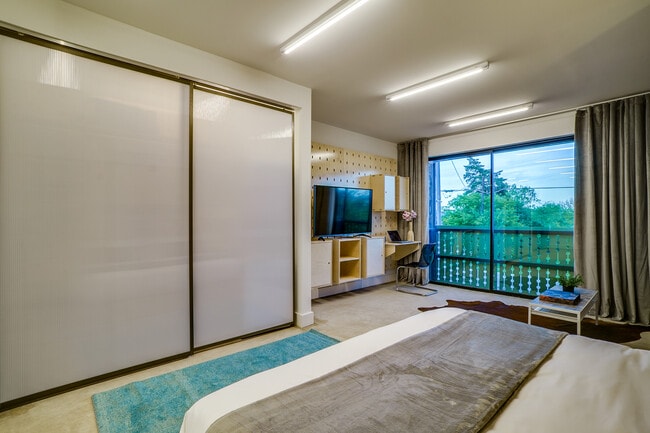 Custom polygal and metal doors give closets a unique boutique and modern presence