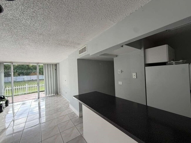 Building Photo - 8801 W Flagler St Unit 104