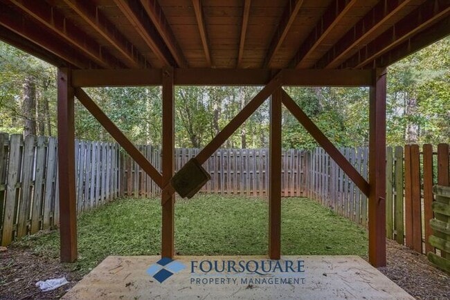 Photo - Lakefront Townhome with 1st Floor Bedroom, Fireplace & 2-Car Garage – In Raleigh