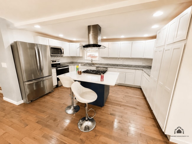 Photo - Spacious Updated 4BR/3BA Home | Garage, W/D, Pet-Friendly – $2,500.00