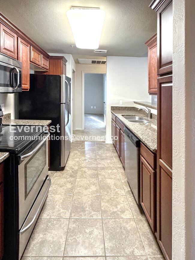Photo - 2550 E River Rd Unit 13206
