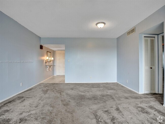 Building Photo - 3050 N Palm Aire Dr Unit 708 Rental