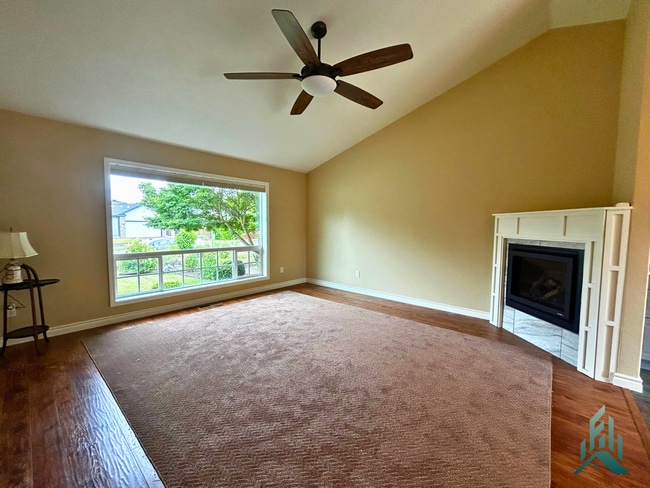 Photo - Beautiful 3 Bed, 2 Bath Home with Solar Panels, Landscaping Included & 2-Car Garage