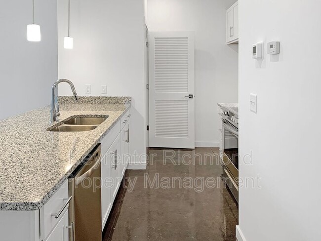 Photo - 114 W 12th St E Unit A