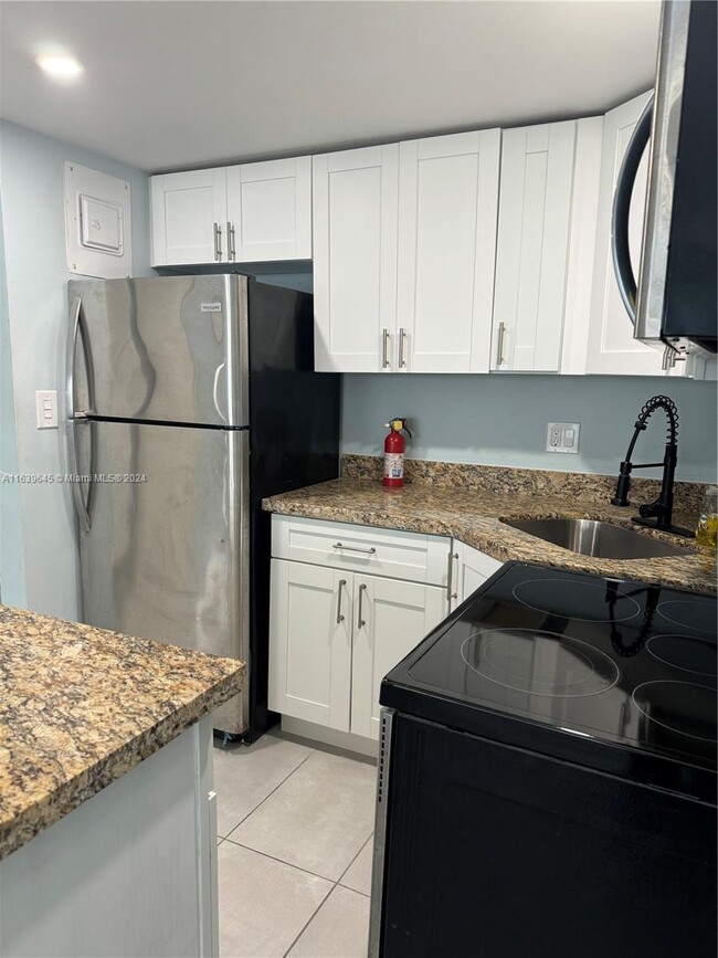 Photo - 261 S Cypress Rd Condo