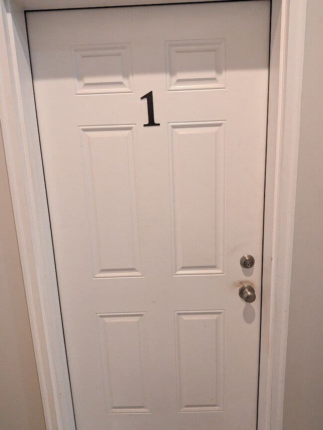 Building Photo - Oversized one bedroom first floor apartment with A/C! Unit 1