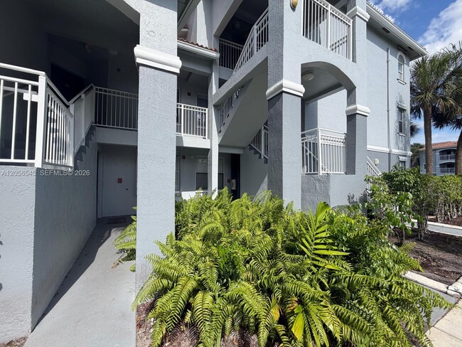 Building Photo - 9645 NW 1st Ct Unit 1-110