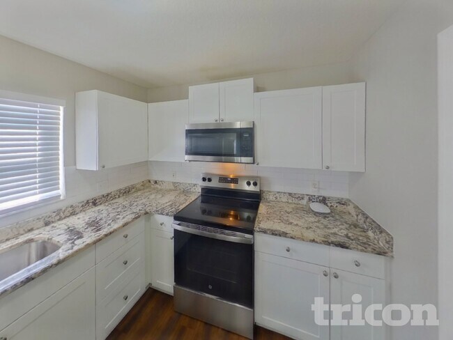 Photo - 1002 E 108th Ave