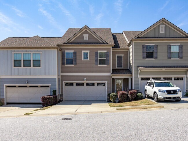 Photo - **MOVE IN SPECIAL! 50% off first month's rent!!** Spacious 4BR Townhouse with 2-Car Garage Near D...
