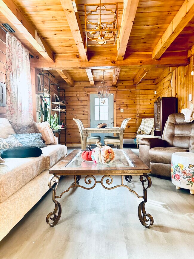 Lovelly living room and dining area with newly constructed laminate floors - 93 Shepard Ave Unit One