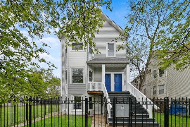 Building Photo - 8026 S Coles Ave Unit 1-G