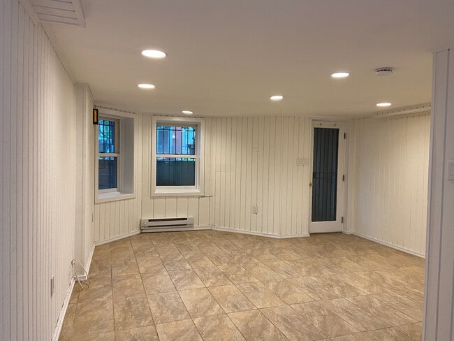 Living room towards street - 112 3rd St NE Unidad Basement