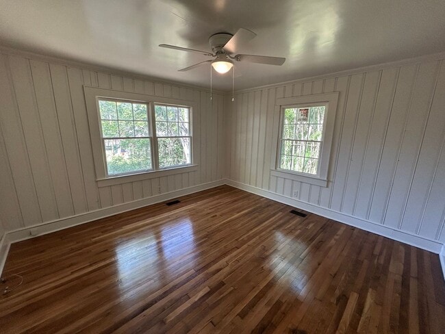 Photo - Hardwood floors and front porch