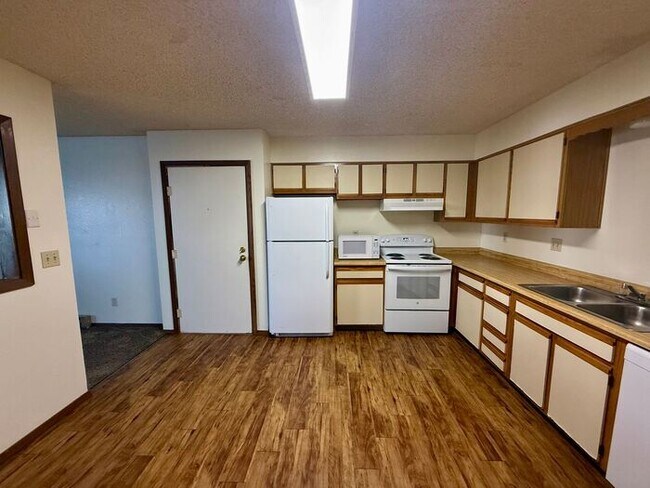 Photo - RENT INCLUDES ALL UTILITIES, except for electric! Large 2 bedroom 1 bath apartment in an 8-plex