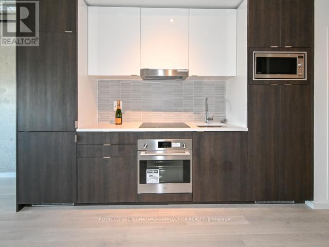 Photo - 21 Lawren Harris Square Unité 418