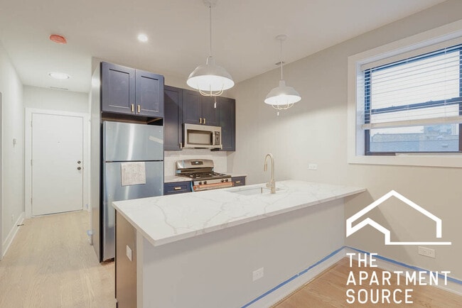 Building Photo - 4409 N Seeley Ave