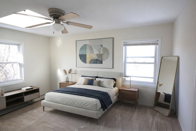 Unwind in the modern elegance of Treetop Apartments, where spacious interiors meet stylish design. This bright bedroom is perfect for relaxation and creativity. Schedule your tour today to envision your new lifestyle!