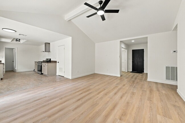 Large open living space with vaulted ceiling