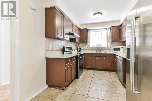 Photo - 166 McNicoll Ave