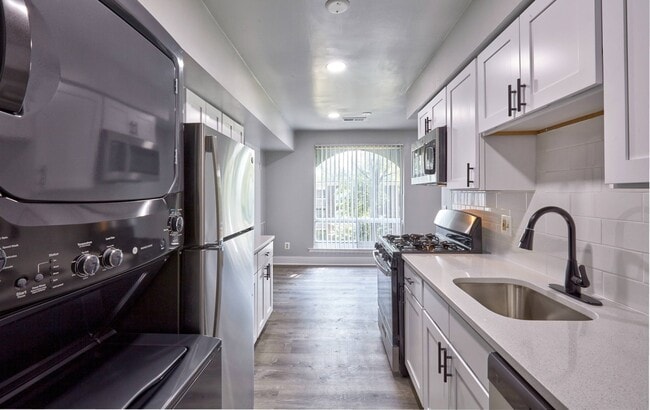 Durable, Quartz Countertops Featuring All-in-One, Deep-bowl Sinks - Seneca Village Apartments