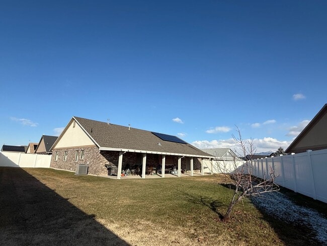 Photo - Beautiful patio home with 2 car garage, central air, fenced yard and covered patio