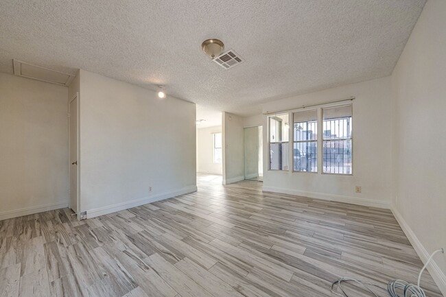 Photo - Charming Single-Level Townhome with Modern Flooring & Update Bathroom & Kitchen