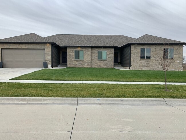 Photo - Daylight ranch townhome with 2 stall garage.  Private driveway and covered deck. high end finishe...