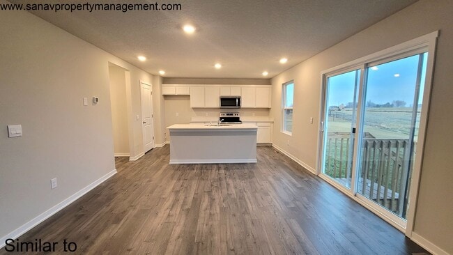 Photo - Turnkey Elegance: 4BR, 2.5BA Two-Story Haven with Gourmet Kitchen & Luxurious Master Suite!-3 CAR...