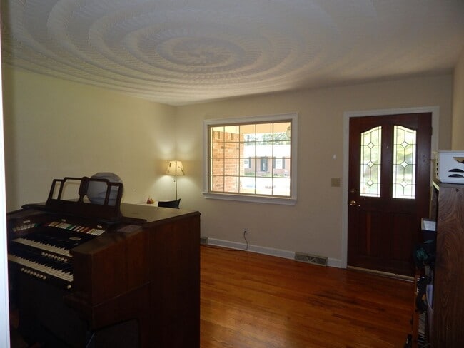 Photo - Beautiful 3 bedroom, 2 full bath home situation on a nearly half acre lot.