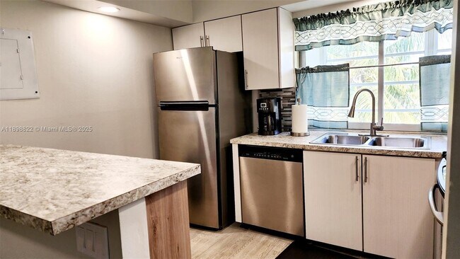 Photo - 9101 Lime Bay Blvd Unit 305