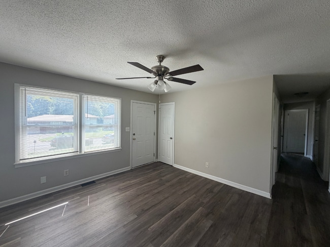 3BR/2BA Huntsville Rental with 1-Car Garage, Hardwood Flooring & Fenced Yard