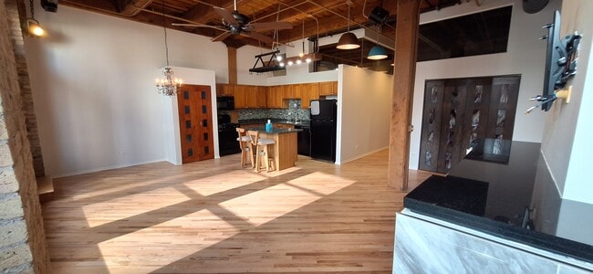 South facing view of Living Room and Kitchen - 226 N Clinton St Unit 321