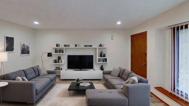 Photo - Updated 2BR/1BA duplex with office in partially finished basement, detached garage and across fro...