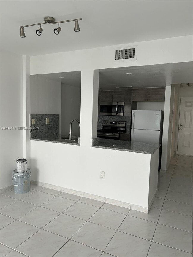 Photo - 6801 Harding Ave Unit 201