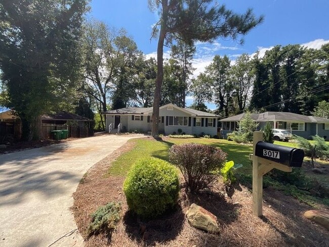 Building Photo - **Spacious 4BR with Modern Upgrades & Cove... Rental