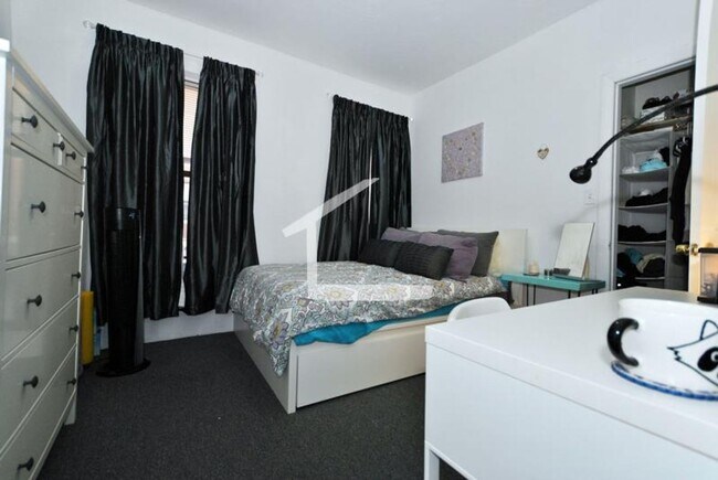 Photo - 4BR 2Bth unit. Great location! On T, walk to supermarket, restaurants.