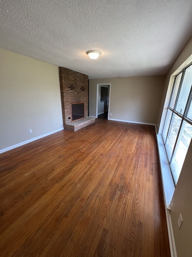 Photo - Bright 4BR Home with Fenced Yard, Hardwood Floors & Garage on Rankin St