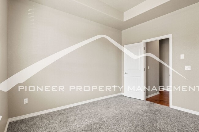 Photo - Main-Level Living in Desirable Wolf Ranch – Finished Basement & 2 Car Garage, AC!