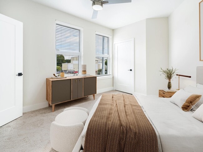 Light-filled bedrooms at Modera Westside Trail offer a calming retreat with clean lines and a spacious, inviting layout.