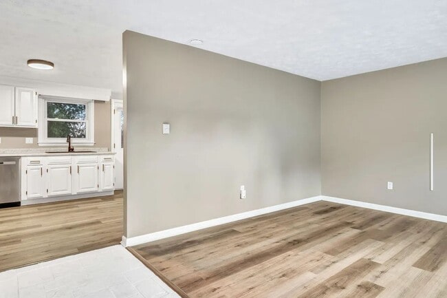 Living room leading to kitchen - 375 Bridgton Rd Unit #43