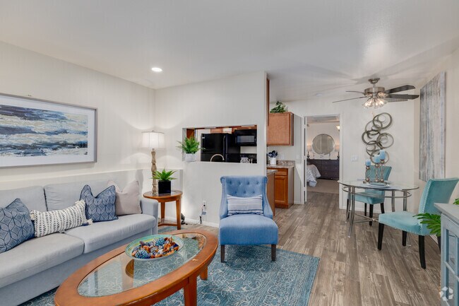 1BR, 1BA - 554SF - Living Room/Kitchen - Cimarron Apartments