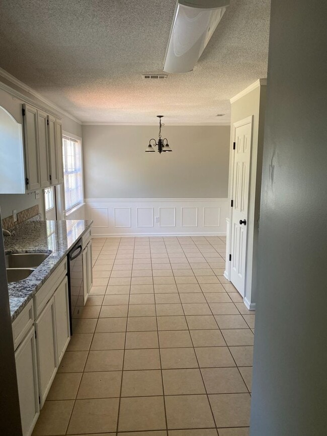 Photo - Spacious 3BR/2BA Home with Open Floor Plan, Granite Countertops & Fenced Backyard