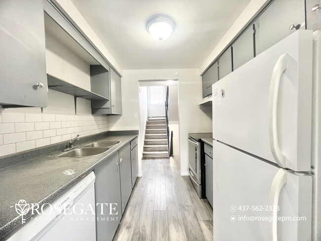 Photo - Spacious 3-Bedroom Stacked Townhouse with Garage & Backyard in Waterloo Unit 2